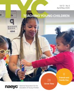 TYC印刷版封面，一名教师和两名幼儿在教室里
